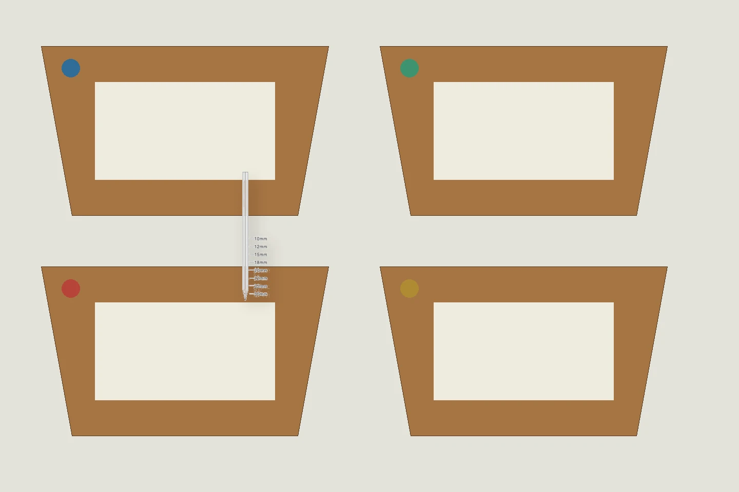 Four picture frame corners with marked pin locations and headless pin samples